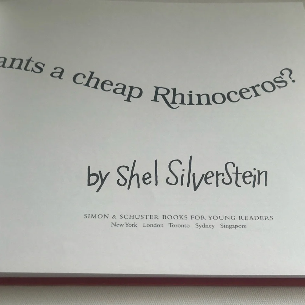 Set of 2 Where the Wild things Are Book & Who wants a cheap rhinoceros Hardback